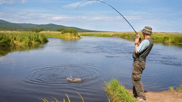 Man fishing in Lake Cahora Bassa