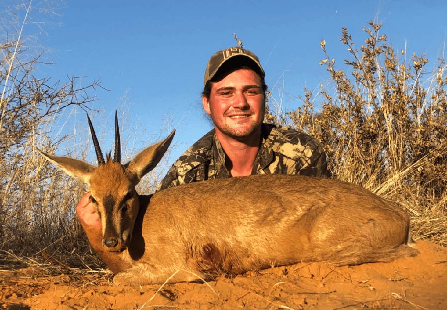 Keenan with the specialist Africa plains game antelope, the gray duiker.